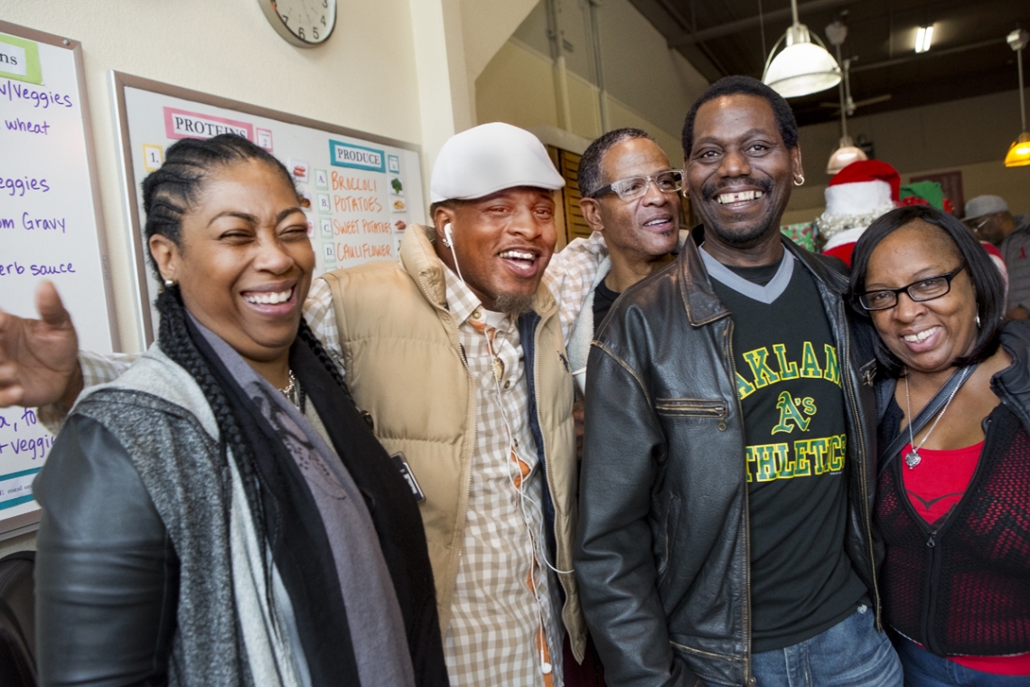 Project Open Hand clients and volunteers celebrate season of giving at a recent Open House at our East Bay Grocery Center in Oakland.