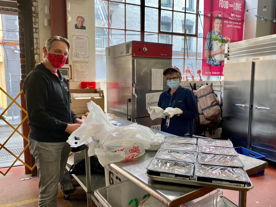 Volunteer in San Francisco Delivery a Meal to a Client